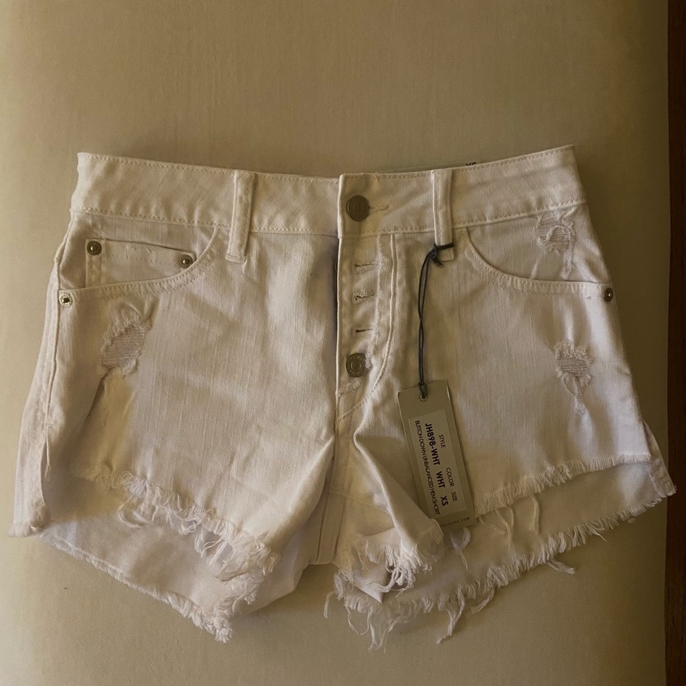 Just USA white denim shorts. Run true to size.